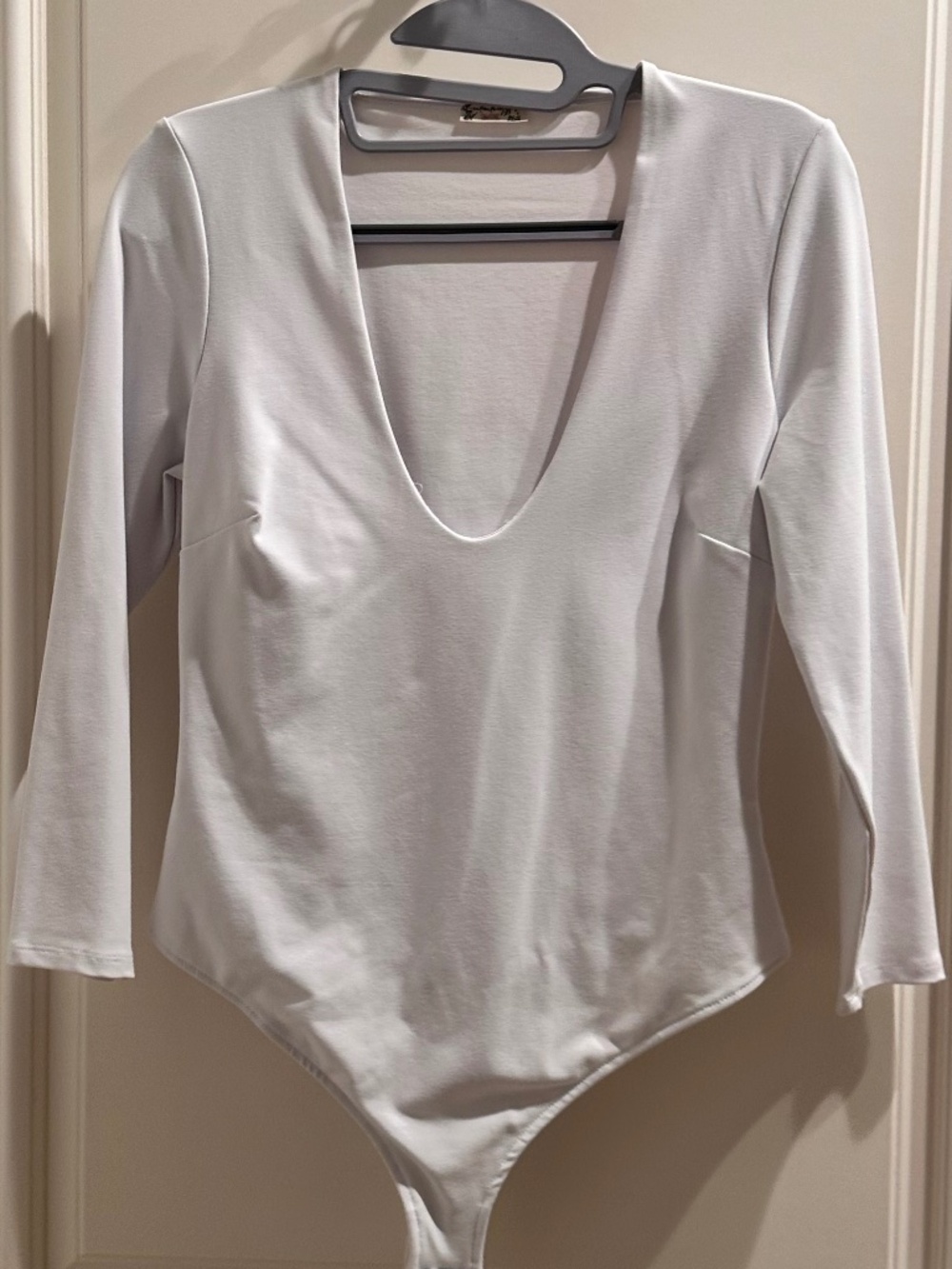 FREE PEOPLE WHITE BODYSUIT — SIZE MEDIUM